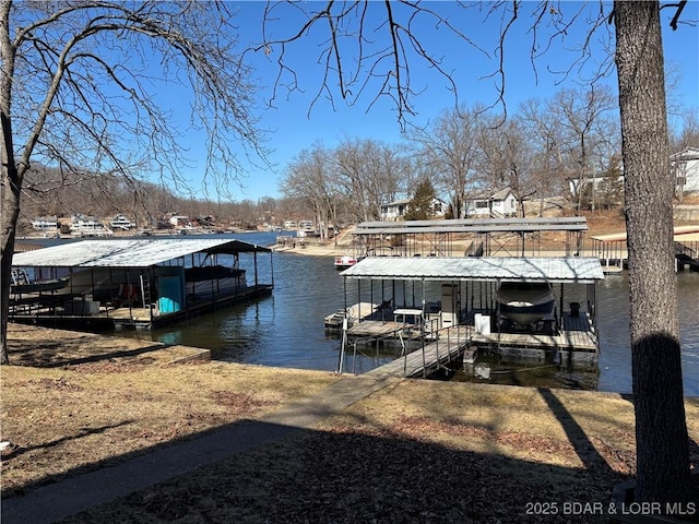 view of dock with a water view and boat lift