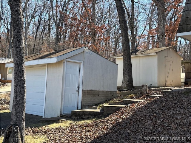 view of outbuilding with an outbuilding and a garage