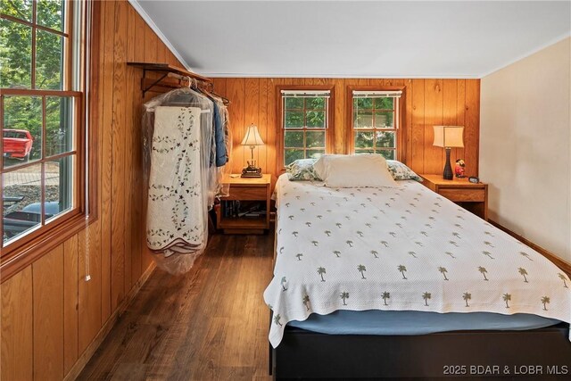 136 Rambling Acres Dr, Gravois Mills, MO 65037 - bedroom with dark wood-style floors, wood walls, and crown molding