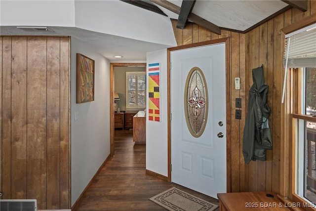 136 Rambling Acres Dr, Gravois Mills, MO 65037 - entryway featuring vaulted ceiling, dark wood-type flooring, visible vents, and wooden walls