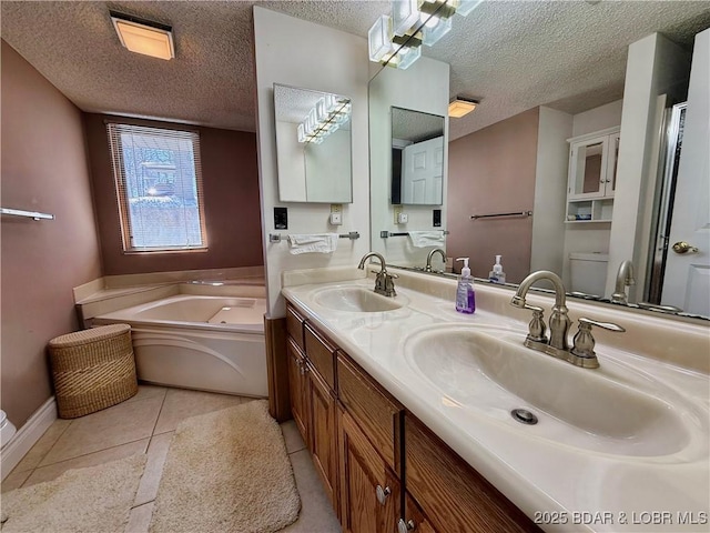 bathroom featuring a sink and a textured ceiling