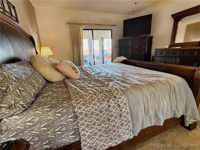 bedroom featuring carpet and access to outside