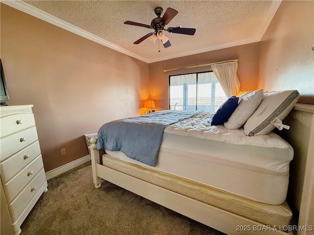 carpeted bedroom featuring ceiling fan, a textured ceiling, baseboards, and crown molding