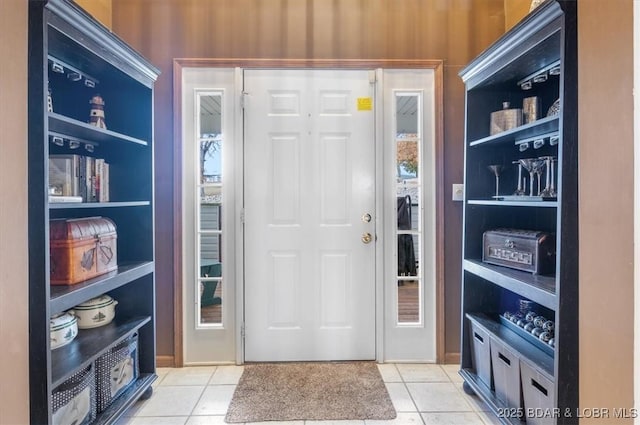 foyer entrance featuring light tile patterned floors