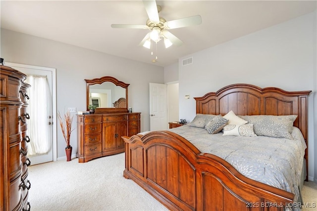 bedroom with light carpet, ceiling fan, and visible vents