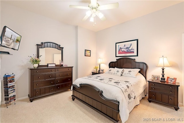 bedroom with light carpet and ceiling fan