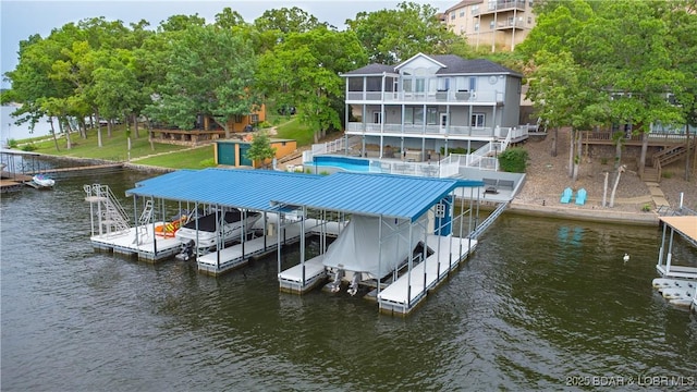 view of dock featuring a water view and boat lift