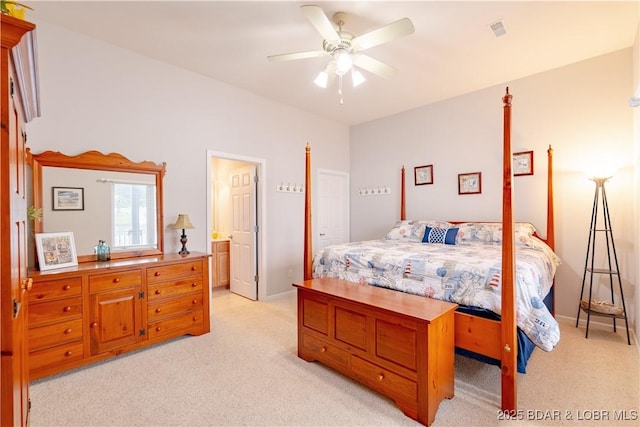 bedroom with light carpet, baseboards, visible vents, and a ceiling fan