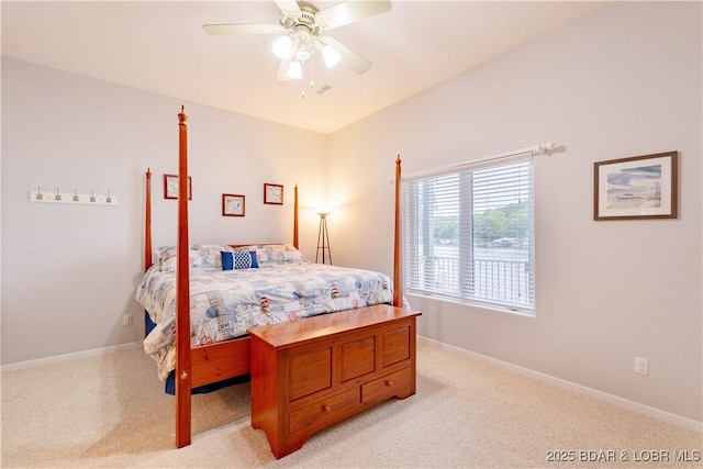 bedroom featuring ceiling fan, visible vents, baseboards, and light colored carpet