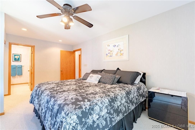 carpeted bedroom featuring ceiling fan, baseboards, and recessed lighting