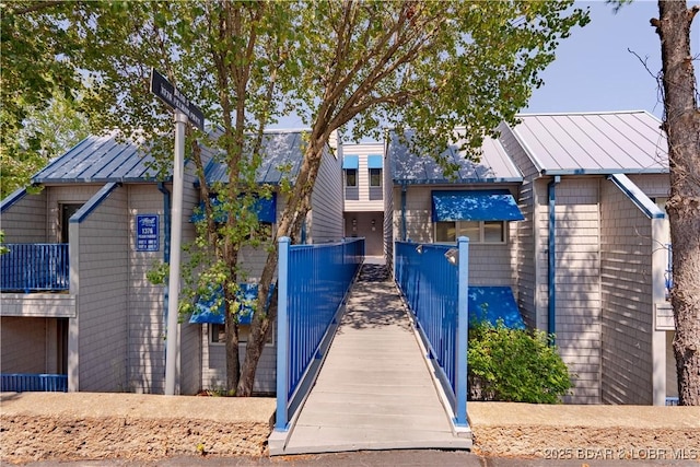 exterior space with a standing seam roof and metal roof