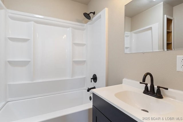 bathroom with vanity and tub / shower combination