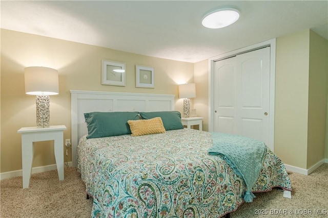 bedroom featuring carpet floors, a closet, and baseboards