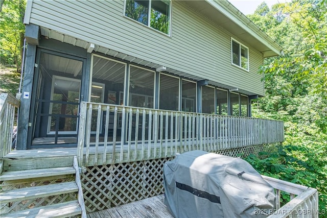 view of home's exterior featuring a sunroom