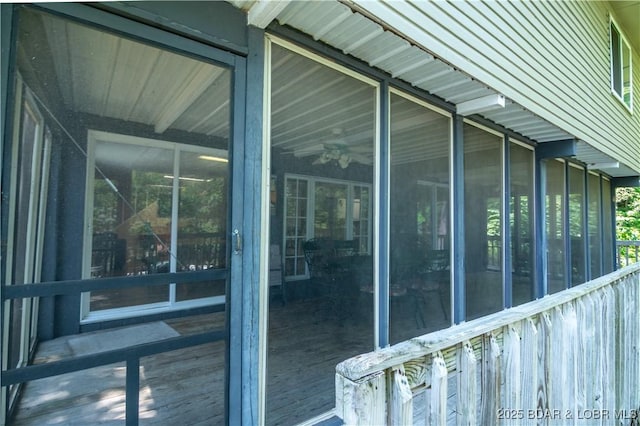 view of side of property featuring a sunroom