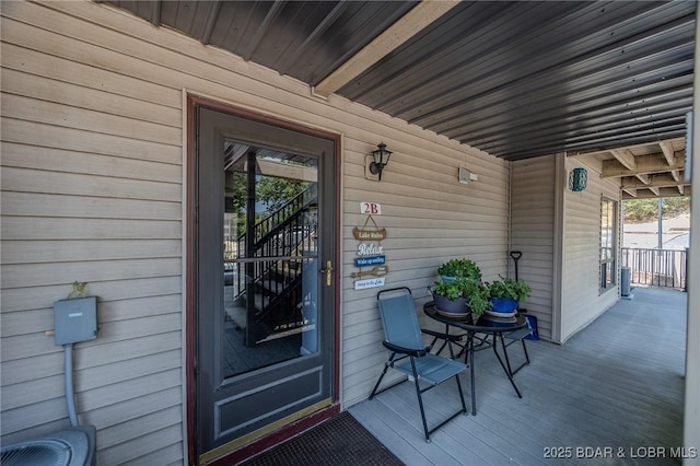 property entrance featuring covered porch