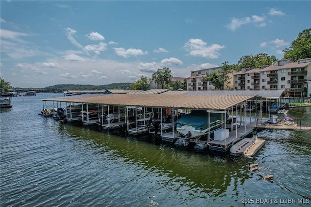 view of dock with a water view and boat lift