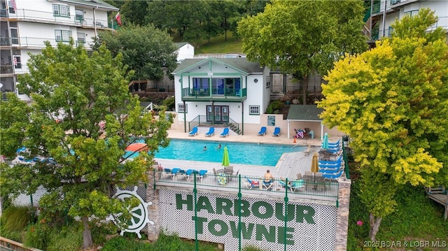 community pool with a patio