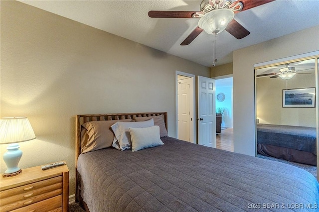 bedroom with a closet and a ceiling fan