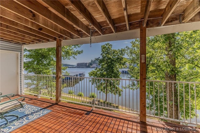 view of patio with a water view