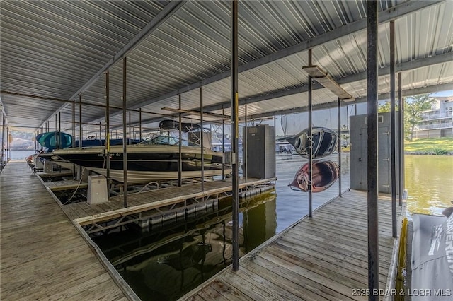 dock area featuring a water view and boat lift