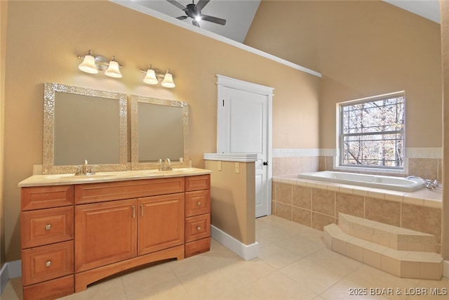 bathroom with a garden tub, double vanity, tile patterned flooring, and a sink