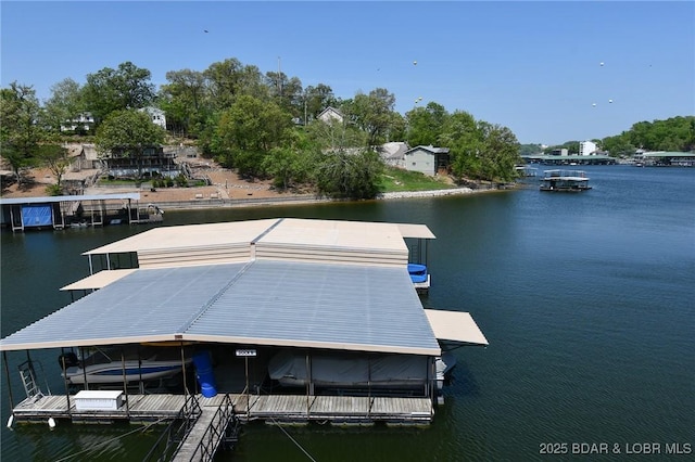 view of dock featuring a water view and boat lift