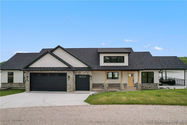 325 Mission Bay Dr, Camdenton, MO 65020 - modern inspired farmhouse featuring board and batten siding, stone siding, and driveway
