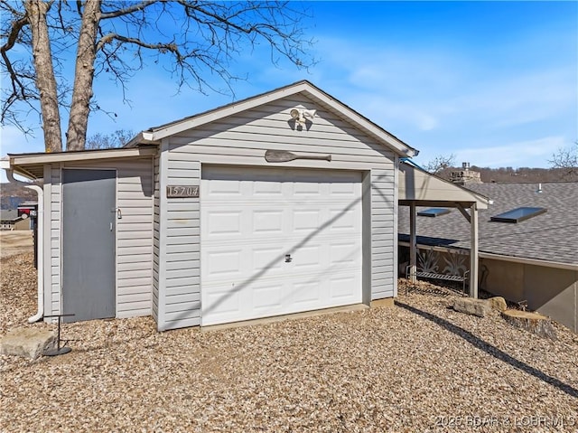 garage with driveway