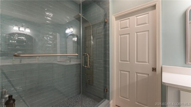 bathroom with a stall shower