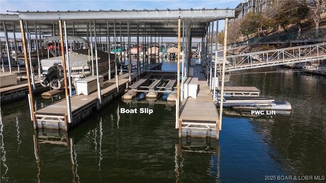 view of dock with a water view