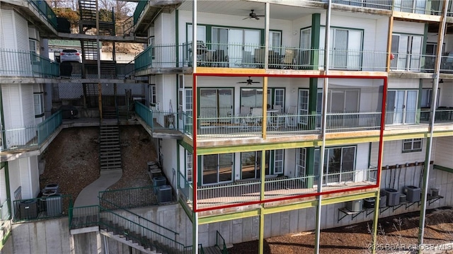 exterior space featuring stairs and central air condition unit