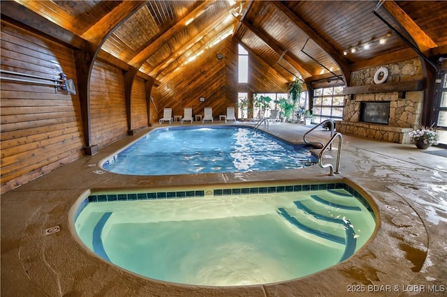 pool with an indoor in ground hot tub