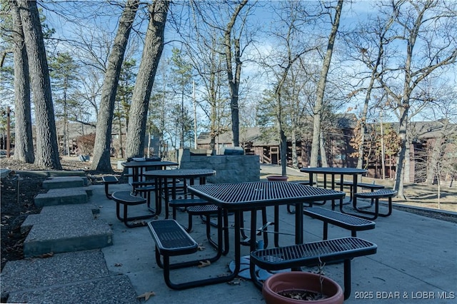 view of home's community with a patio