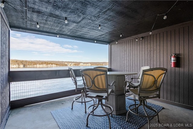 balcony featuring a water view