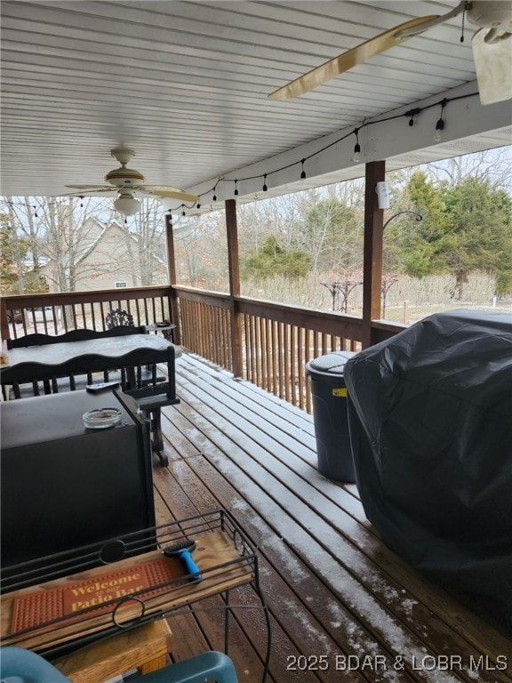 deck featuring ceiling fan and grilling area