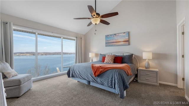 bedroom with vaulted ceiling, access to outside, a water view, and carpet flooring