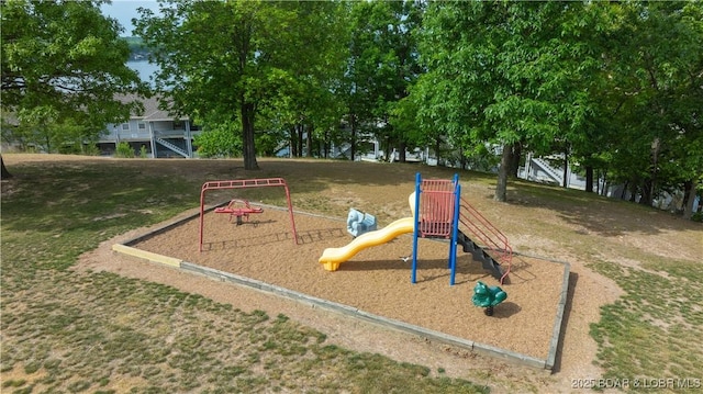 community play area featuring a yard