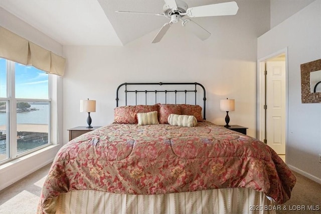 carpeted bedroom featuring ceiling fan and baseboards