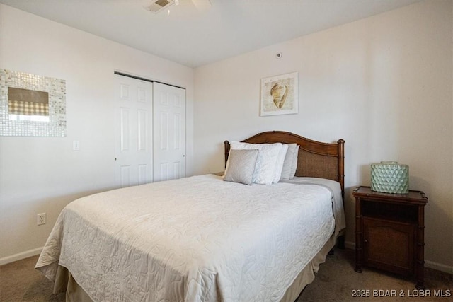 carpeted bedroom with a closet, visible vents, and baseboards