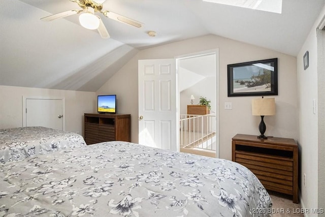 bedroom with lofted ceiling and ceiling fan