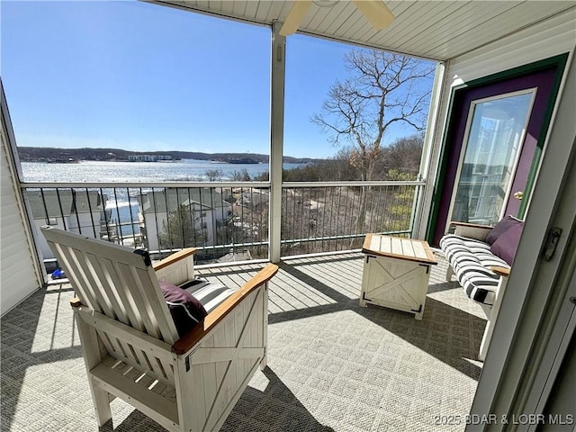 balcony with a sunroom and ceiling fan