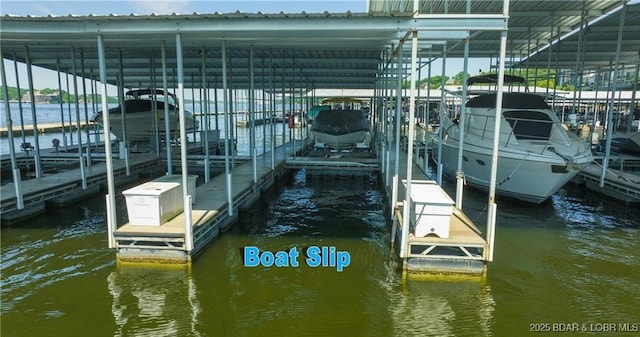 view of dock featuring a water view and boat lift