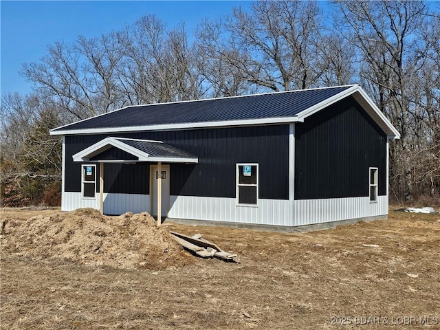 exterior space featuring metal roof