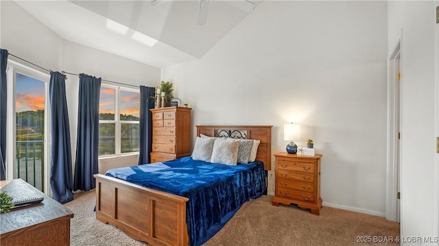 bedroom with light carpet, vaulted ceiling, and ceiling fan