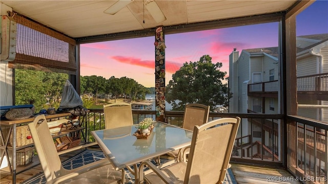 view of patio featuring outdoor dining space and ceiling fan