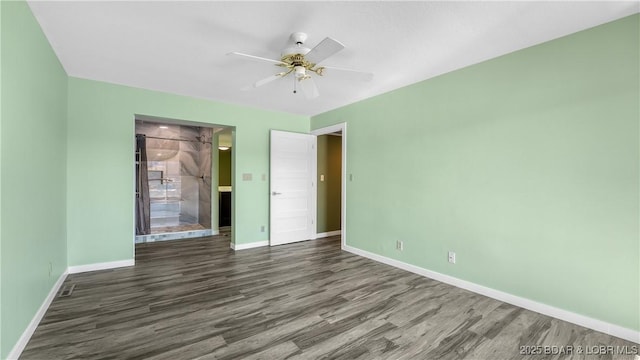 unfurnished bedroom featuring a ceiling fan, baseboards, and wood finished floors