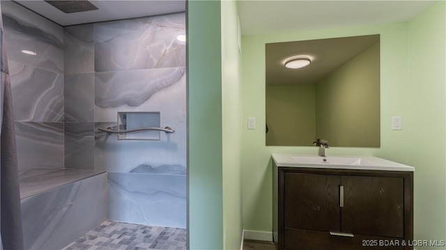 bathroom with vanity and walk in shower