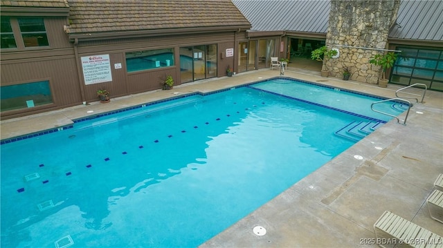 community pool featuring a patio