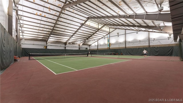 view of sport court with fence